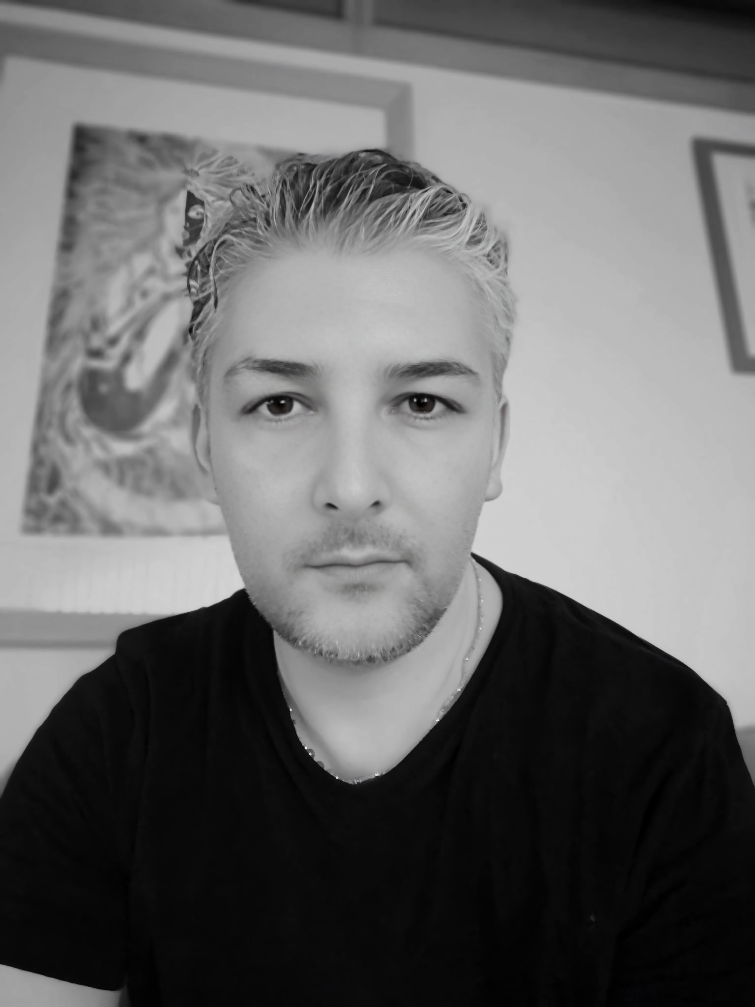 Black-and-white portrait of Pietro Luciano, Software Engineer and creator of the Amo Montesarchio project